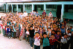 San Juan schoolchildren with pencils.